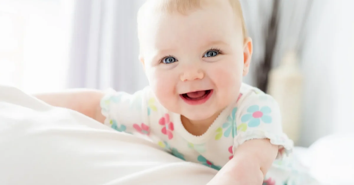 Toddler smiling at you.